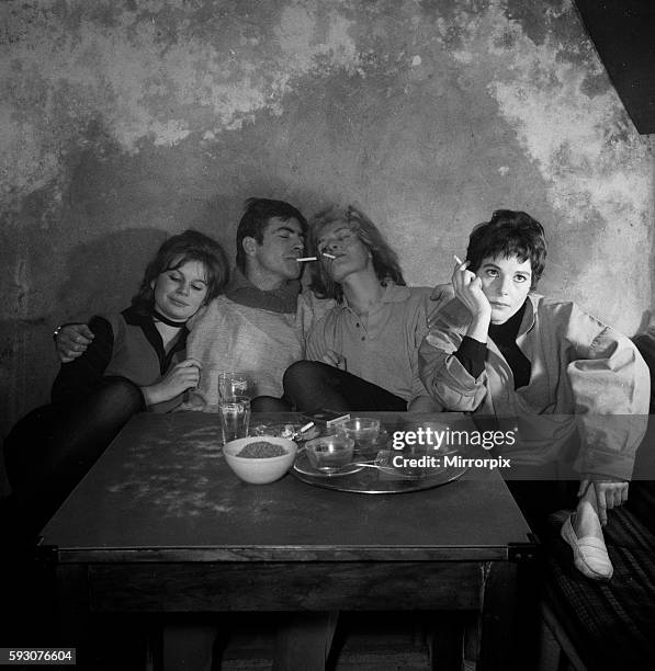 Joanna Dunham, Alan Bates, Sheila Allen and French actress Malon Pantari in Cafe de Artistes in Chelsea getting the feel of a Beatnik's lifestyle for...