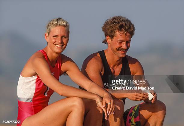 Katrin Krabbe of Germany sits with her coach Thomas Springsteen during a photo session while training in June 1991 near San Diego, California.