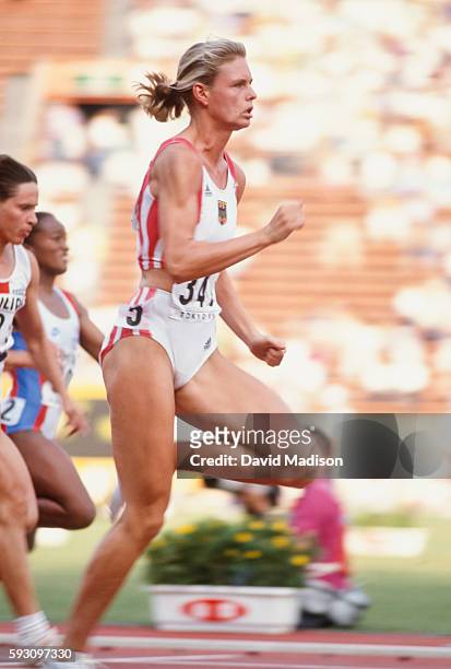 Katrin Krabbe of Germany competes in the 100 meter event of the 1991 IAAF World Championships during August 1991 at the National Olympic Stadium in...