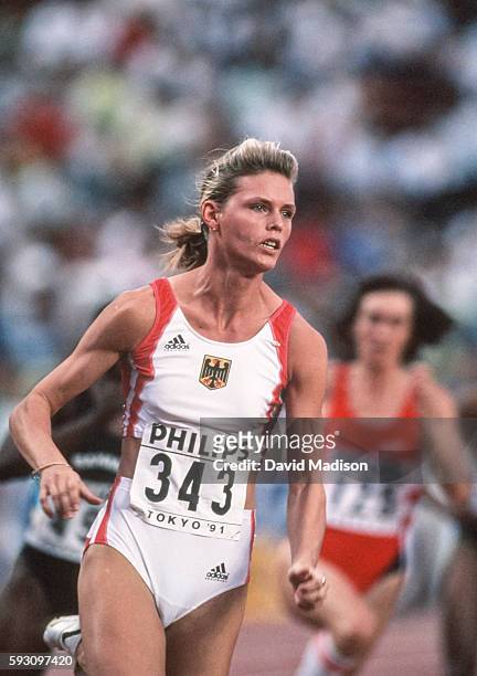Katrin Krabbe of Germany competes in the 200 meter event of the 1991 IAAF World Championships during August 1991 at the National Olympic Stadium in...