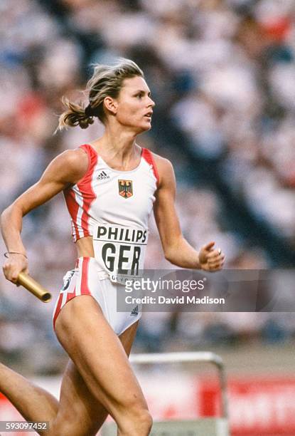 Katrin Krabbe of Germany competes in the 4 x 100 meter relay event of the 1991 IAAF World Championships during August 1991 at the National Olympic...