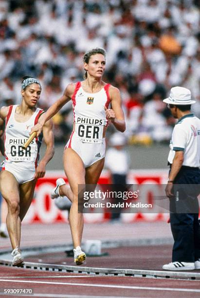 Katrin Krabbe of Germany competes in the 4 x 100 meter relay event of the 1991 IAAF World Championships during August 1991 at the National Olympic...