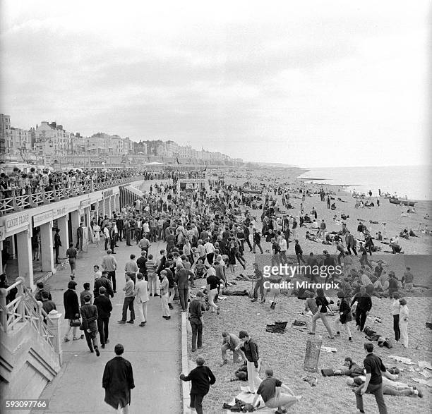 Mods and Rockers clash on Brighton beach during 1964 bank holiday. August 1964. S6929-4