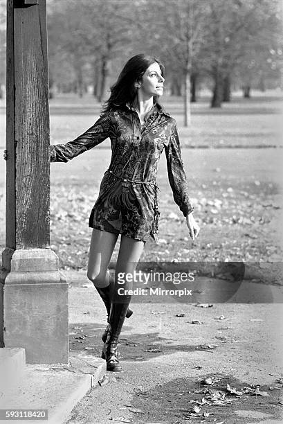 Making use of a sunny day in late November is actress and model, Ann Collins who is walking in Kensington Garden. November 1969 Z11210-001