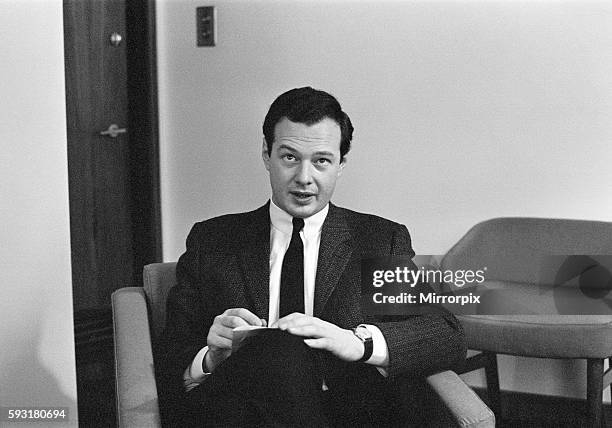 Brian Epstein, Manager of The Beatles, pictured being interviewed for the Daily Mirror in Hotel Suite, overlooking Park Lane, London, 20th October...