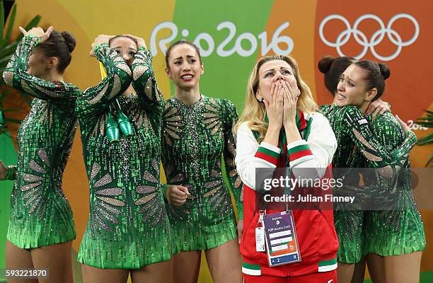 Reneta Kamberova, Lyubomira Kazanova, Mihaela Maevska, Tsvetelina Naydenova and Hristiana Todorova of Bulgaria react after winning bronze during the...