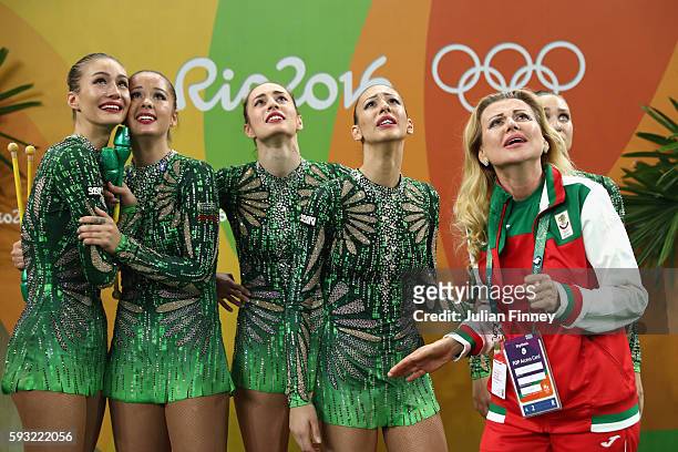 Reneta Kamberova, Lyubomira Kazanova, Mihaela Maevska, Tsvetelina Naydenova and Hristiana Todorova of Bulgaria react after winning bronze during the...
