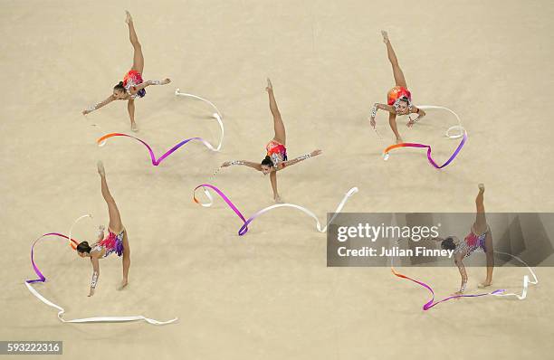 Hanna Dudzenkova, Maria Kadobina, Maryia Katsiak, Valeriya Pischelina and Arina Tsitsilina of Belarus compete during the Group All-Around Final on...