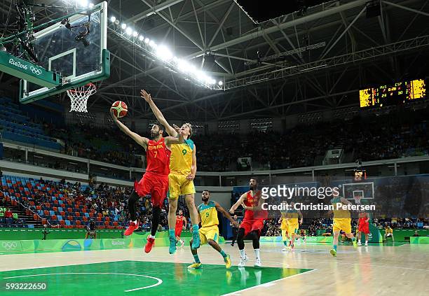 Juan-Carlos Navarro of Spain drives the basket against Ryan Broekhoff of Australia during the Men's Basketball Bronze medal game between Australia...