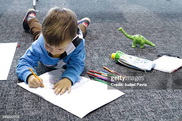 boy drawing on the floor - bruselas stock pictures, royalty-free photos & images