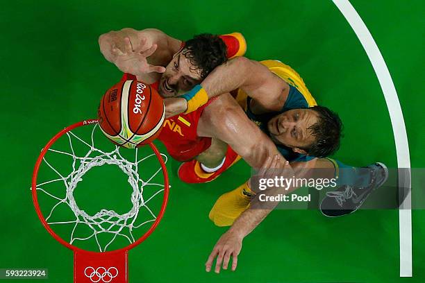 Pau Gasol of Spain and David Andersen of Australia compete for the ball during the Men's Basketball Bronze medal game between Australia and Spain on...