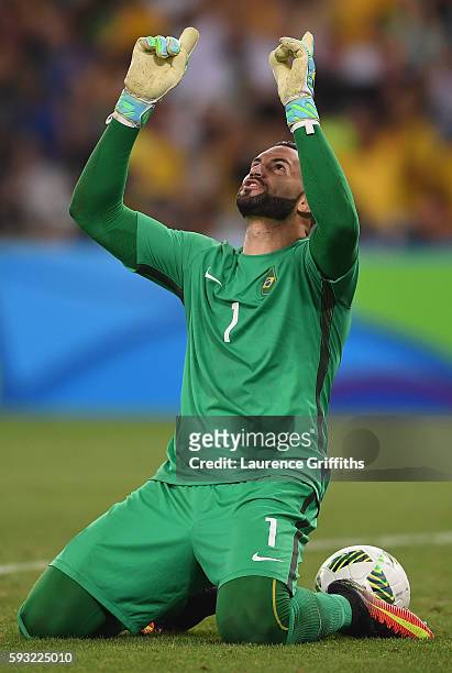 Weverton of Brazil celebrates victory after the penalty shoot out during the Men's Football Final between Brazil and Germany at the Maracana Stadium...