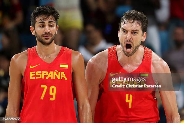 Ricky Rubio of Spain and Pau Gasol of Spain celebrate during the Men's Basketball Bronze medal game between Australia and Spain on Day 16 of the Rio...