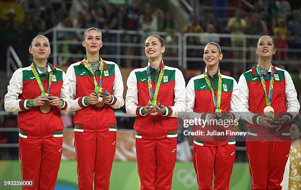 Bronze medalists Reneta Kamberova, Lyubomira Kazanova, Mihaela Maevska, Tsvetelina Naydenova and Hristiana Todorova of Bulgaria celebrate during the...