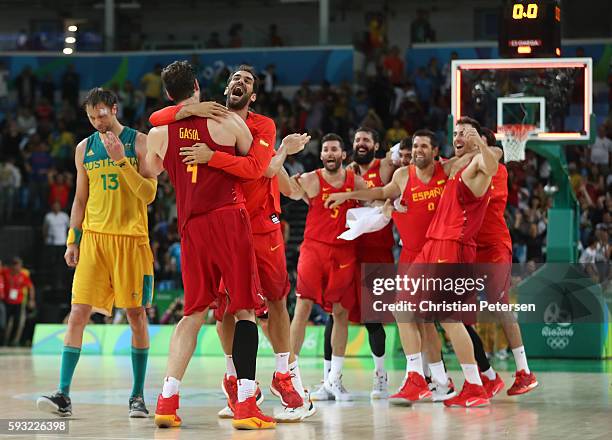 Team Spain celebrate winning the Men's Basketball Bronze medal game between Australia and Spain on Day 16 of the Rio 2016 Olympic Games at Carioca...