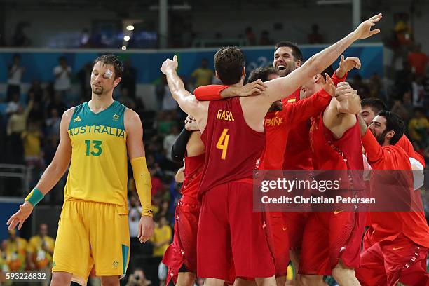 David Andersen of Australia shows his emotion against Team Spain celebrate winning the Men's Basketball Bronze medal game between Australia and Spain...