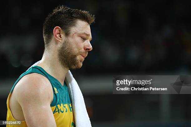 Matthew Dellavedova of Australia shows his emotion after losing the Men's Basketball Bronze medal game between Australia and Spain on Day 16 of the...