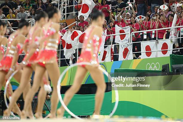 Fans of Japan cheer on Airi Hatakeyama, Rie Matsubara, Sakura Noshitani, Sayuri Sugimoto and Kiko Yokota of Japan during the Group All-Around Final...