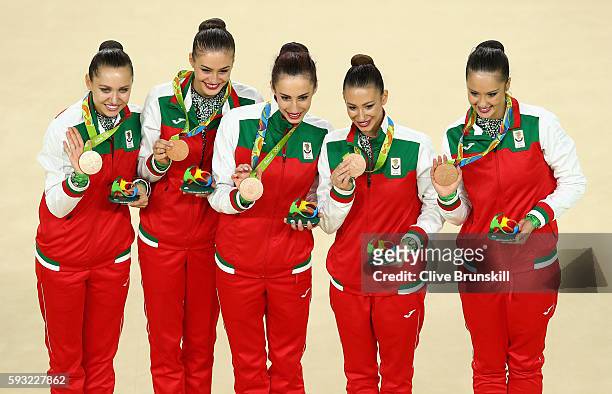 Bronze medalists Reneta Kamberova, Lyubomira Kazanova, Mihaela Maevska, Tsvetelina Naydenova and Hristiana Todorova of Bulgaria celebrate during the...