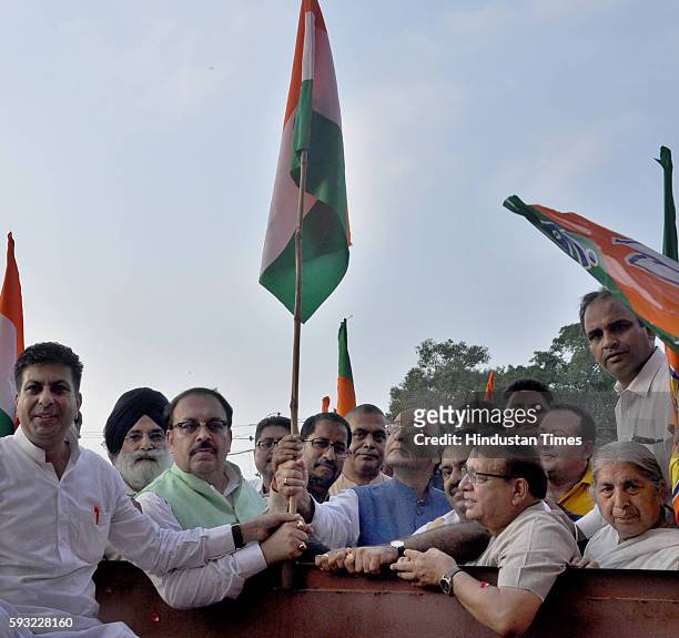 Union Finance Minister Arun Jaitley along with other BJP leaders during the BJP Tiranga Yatra rally as part of 70th Independence Day celebrations, on...