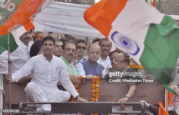 Union Finance Minister Arun Jaitley along with other BJP leaders during the BJP Tiranga Yatra rally as part of 70th Independence Day celebrations, on...