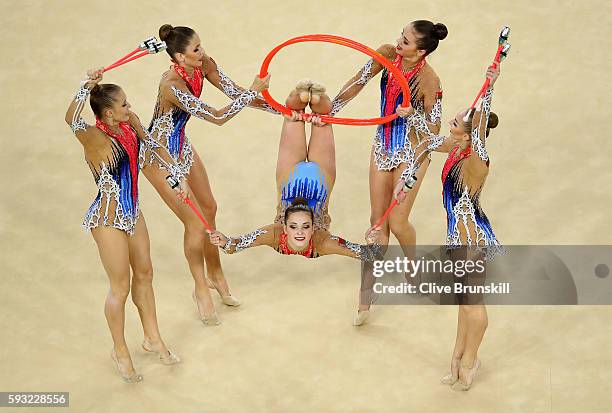 Hanna Dudzenkova, Maria Kadobina, Maryia Katsiak, Valeriya Pischelina and Arina Tsitsilina of Belarus compete during the Group All-Around Final on...