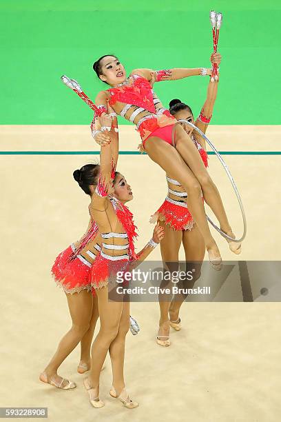Airi Hatakeyama, Rie Matsubara, Sakura Noshitani, Sayuri Sugimoto and Kiko Yokota of Japan compete during the Group All-Around Final on Day 16 of the...