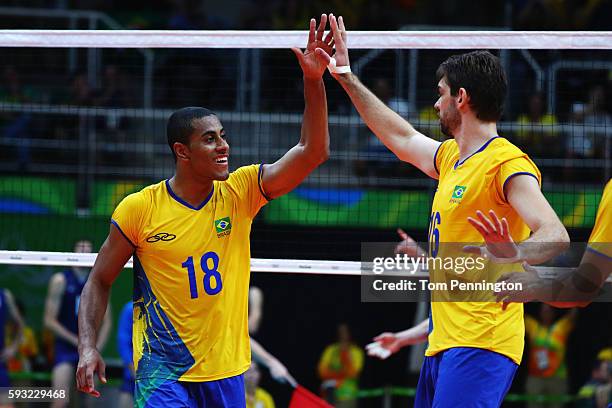 Ricardo Lucarelli of Brazil and Lucas Saatkamp of Brazil react during the Men's Gold Medal Match between Italy and Brazil on Day 16 of the Rio 2016...