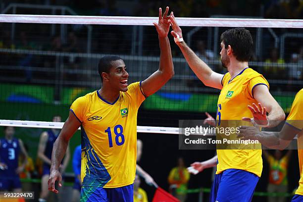 Ricardo Lucarelli of Brazil and Lucas Saatkamp of Brazil react during the Men's Gold Medal Match between Italy and Brazil on Day 16 of the Rio 2016...