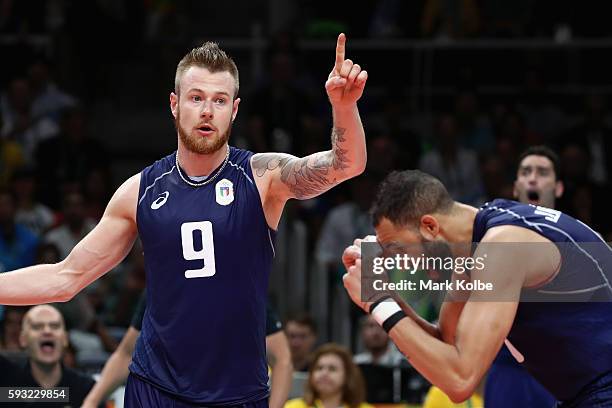Ivan Zaytsev of Italy celebrates with his team during the Men's Gold Medal Match between Italy and Brazil on Day 16 of the Rio 2016 Olympic Games at...