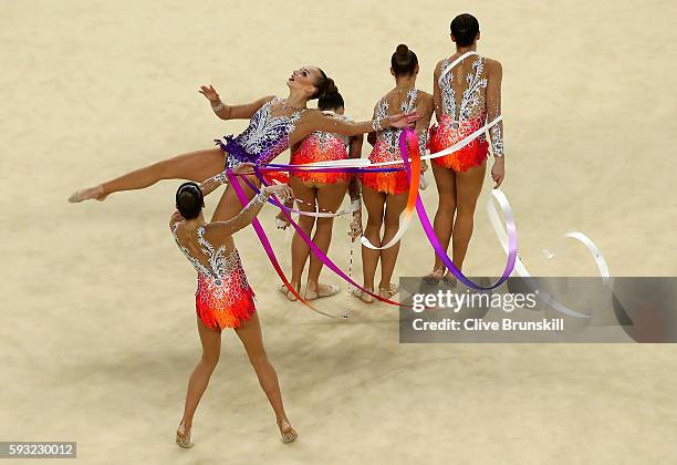 Hanna Dudzenkova, Maria Kadobina, Maryia Katsiak, Valeriya Pischelina and Arina Tsitsilina of Belarus compete during the Group All-Around Final on...