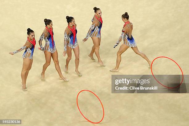 Hanna Dudzenkova, Maria Kadobina, Maryia Katsiak, Valeriya Pischelina and Arina Tsitsilina of Belarus compete during the Group All-Around Final on...