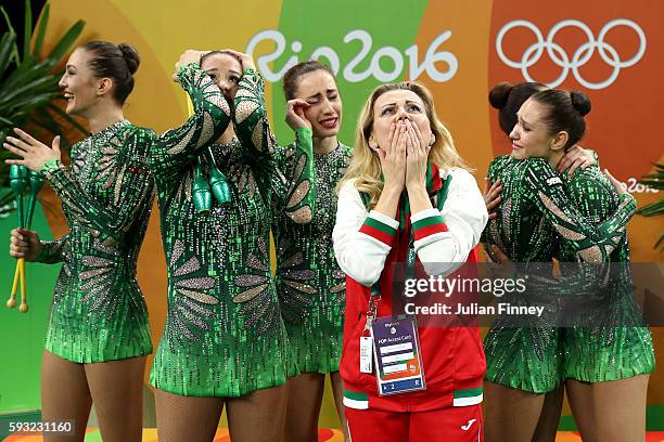 Reneta Kamberova, Lyubomira Kazanova, Mihaela Maevska, Tsvetelina Naydenova and Hristiana Todorova of Bulgaria react after winning bronze during the...