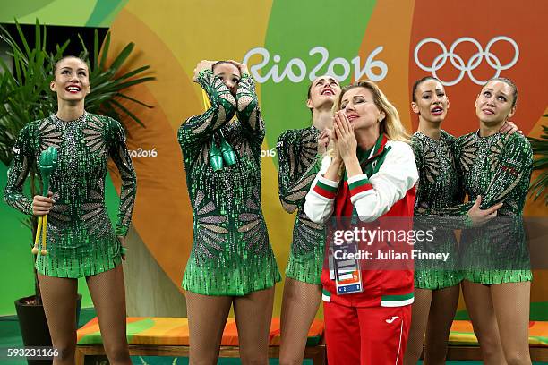 Reneta Kamberova, Lyubomira Kazanova, Mihaela Maevska, Tsvetelina Naydenova and Hristiana Todorova of Bulgaria react after winning bronze during the...