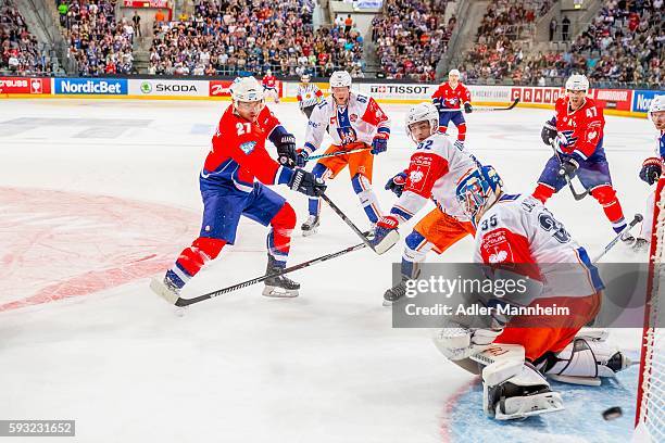 Ryan MacMurchy / Adler Otso Tantakari / TAP Teemu Lassila / TAP during the Champions Hockey League match between Adler Mannheim and Tappara Tampere...