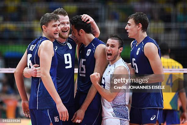 Italy's Oleg Antonov, Italy's Ivan Zaytsev, Italy's Emanuele Birarelli, Italy's Massimo Colaci and Italy's Simone Giannelli celebrate after scoring...