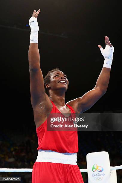 Claressa Maria Shields of the United States celebrates victory over Nouchka Fontijn of the Netherlands in the Women's Middle Final Bout on Day 16 of...