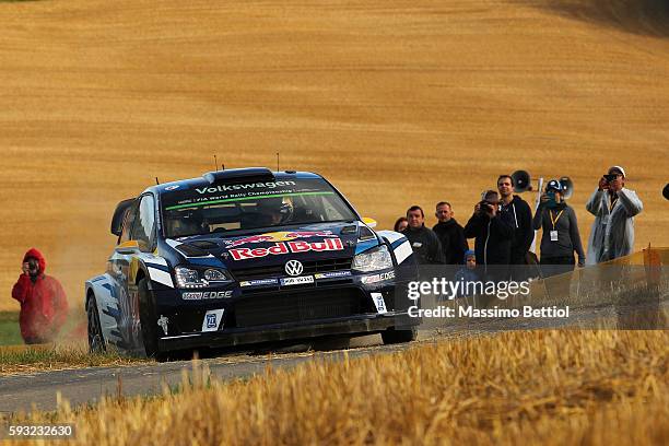 Andreas Mikkelsen of Norway and Anders Jaeger of Norway compete in their Volkswagen Motorport II Volkswagen Polo R WRC during Day Three of the WRC...