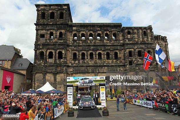 Sebastien Ogier of France and Julien Ingrassia of France celebrate their victory during Day Three of the WRC Germany on August 21, 2016 in Trier,...