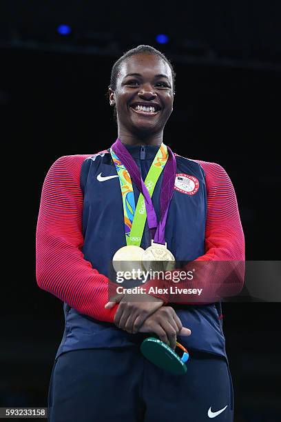 Gold medalist Claressa Maria Shields of the United States poses on the podium during the medal ceremony for the Women's Boxing Middle on Day 16 of...