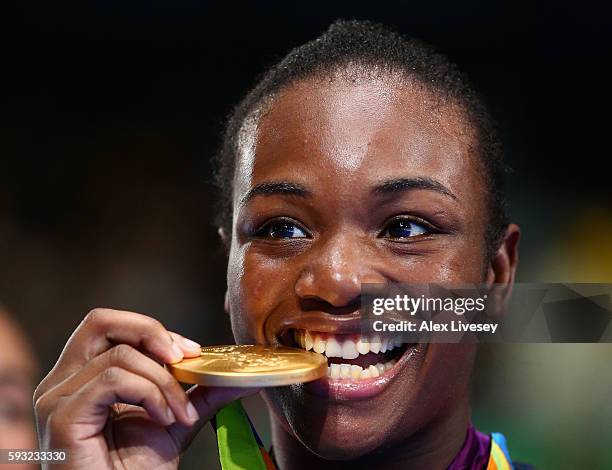 Gold medalist Claressa Maria Shields of the United States poses on the podium during the medal ceremony for the Women's Boxing Middle on Day 16 of...