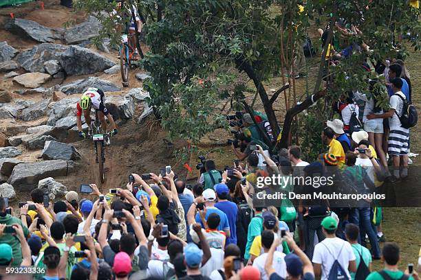 Nino Schurter of Switzerland rides during the Men's Cross-Country on Day 16 of the Rio 2016 Olympic Games at Mountain Bike Centre on August 21, 2016...