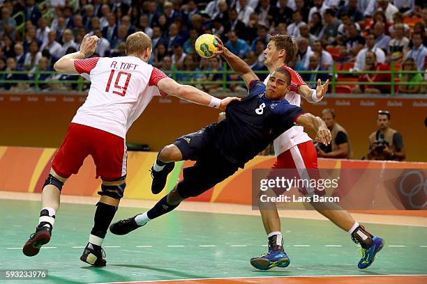 Daniel Narcisse of France jumps to take a shot during the Men's Gold Medal Match between Denmark and France on Day 16 of the Rio 2016 Olympic Games...