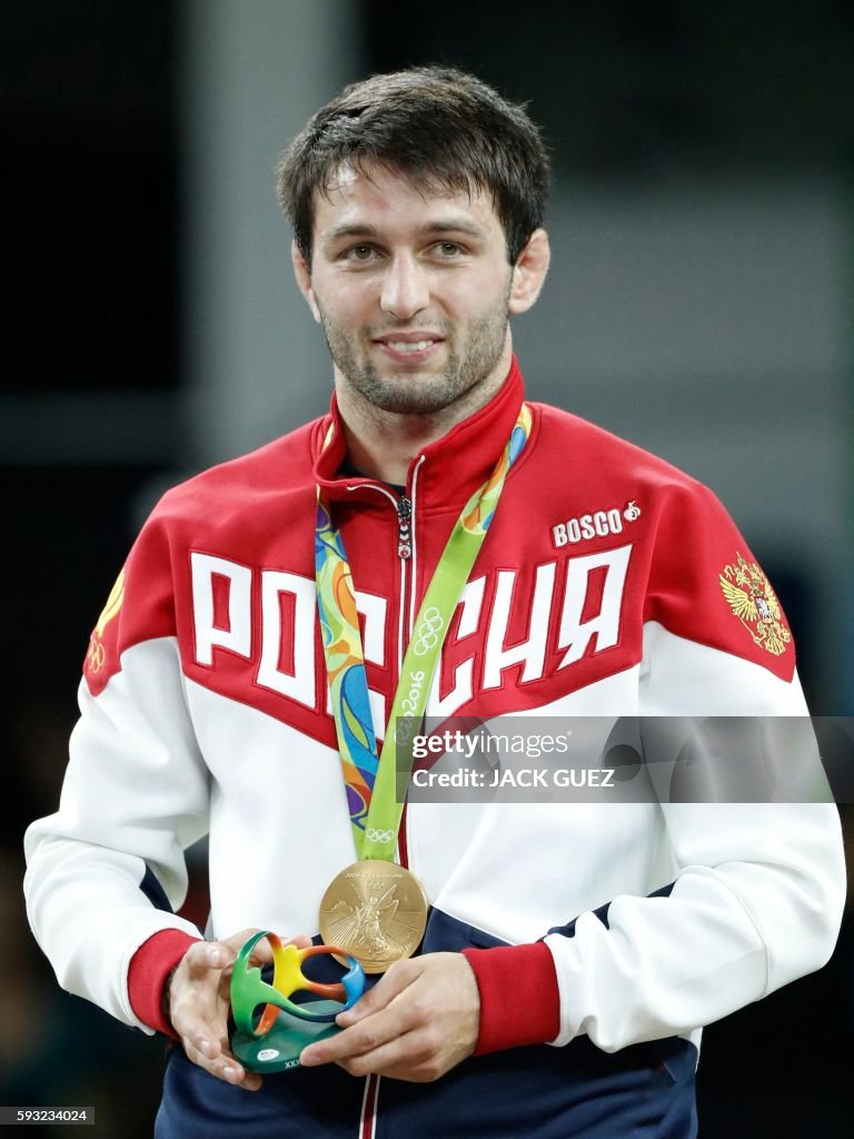 Soslan Ramonov Russia's gold medallist Soslan Ramonov poses on the podium at the end ...