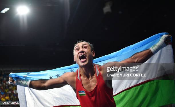 Uzbekistan's Fazliddin Gaibnazarov celebrates winning against against Azerbaijan's Lorenzo Sotomayor Collazo during the Men's Light Welter Final Bout...