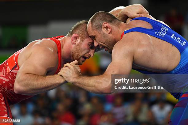 Kyle Frederick Snyder of the United States competes against Khetag Goziumov of Azerbaijan during the Men's Freestyle 97kg Gold medal match on Day 16...