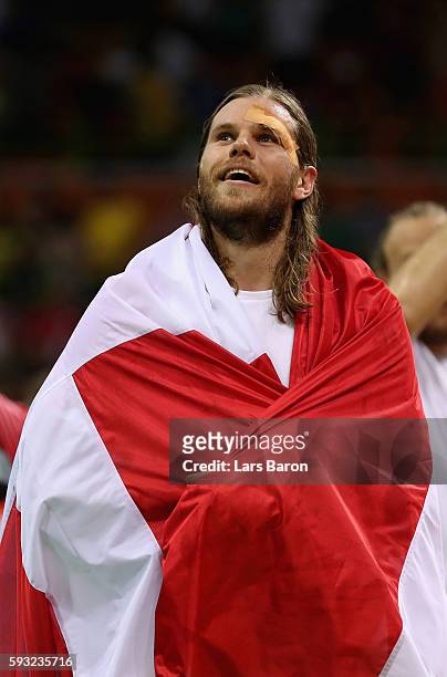 Mikkel Hansen of Denmark reacts after defeating France 28-26 to win the gold medal in Men's Handball on Day 16 of the Rio 2016 Olympic Games at...