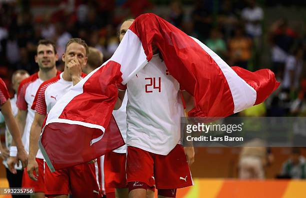 Mikkel Hansen of Denmark reacts after defeating France 28-26 to win the gold medal in Men's Handball on Day 16 of the Rio 2016 Olympic Games at...