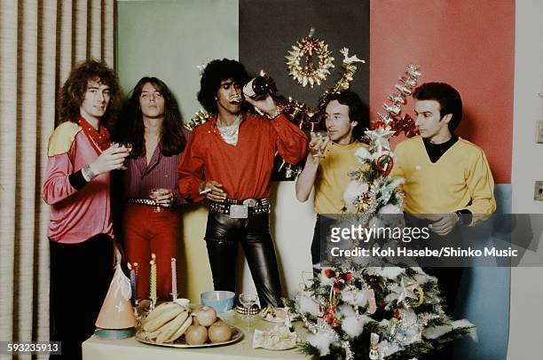 Thin Lizzy taking a photo in the Christmas party scene, Yokohama, September 1980.