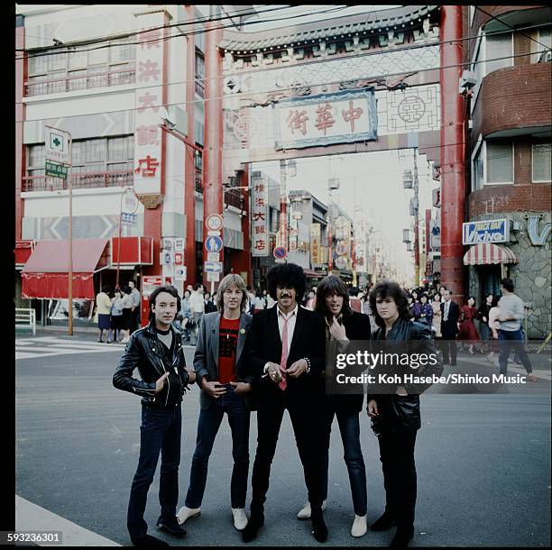 Thin Lizzy posing at the entrance of Yokohama China Town, Yokohama, September 1980.